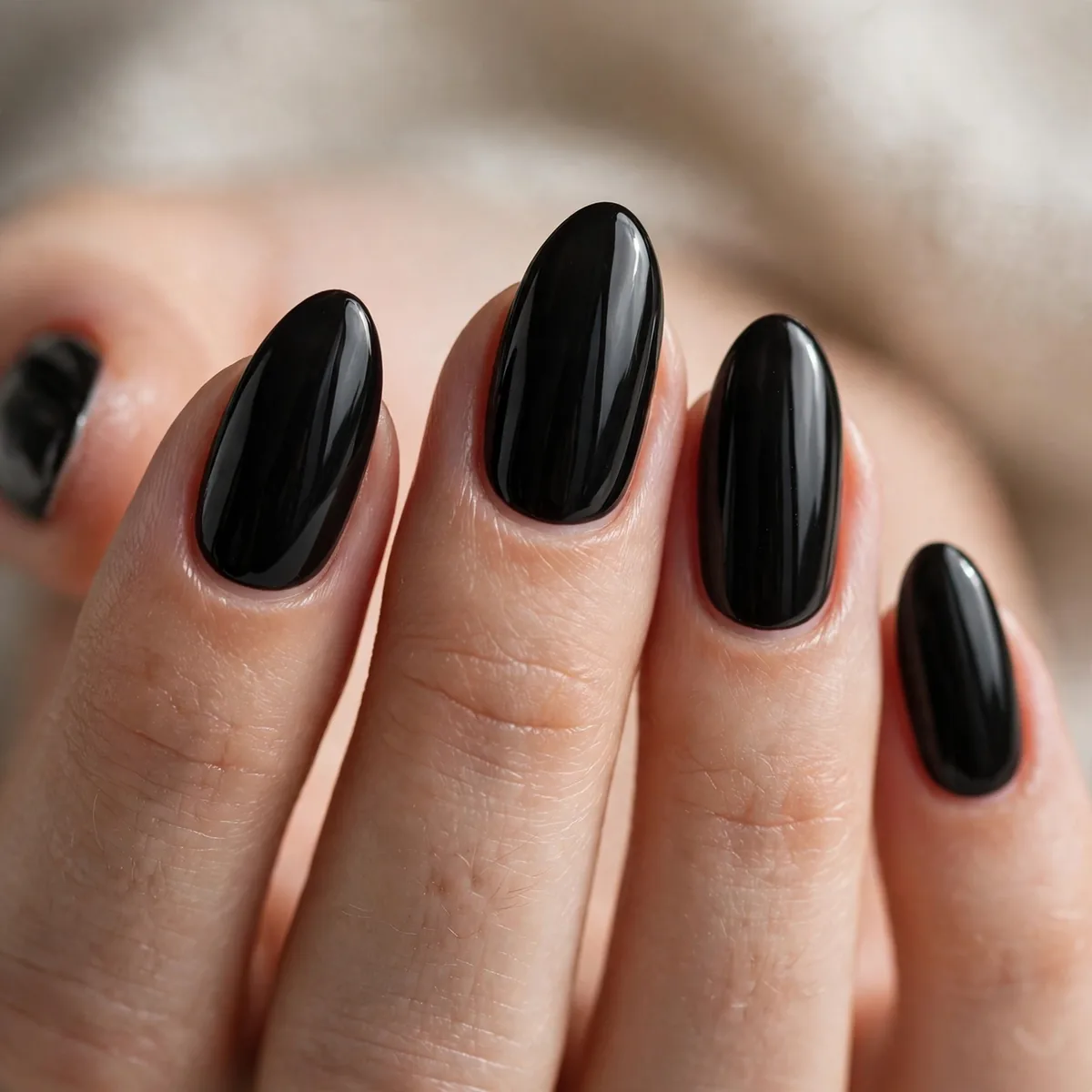 Black polish on almond nails