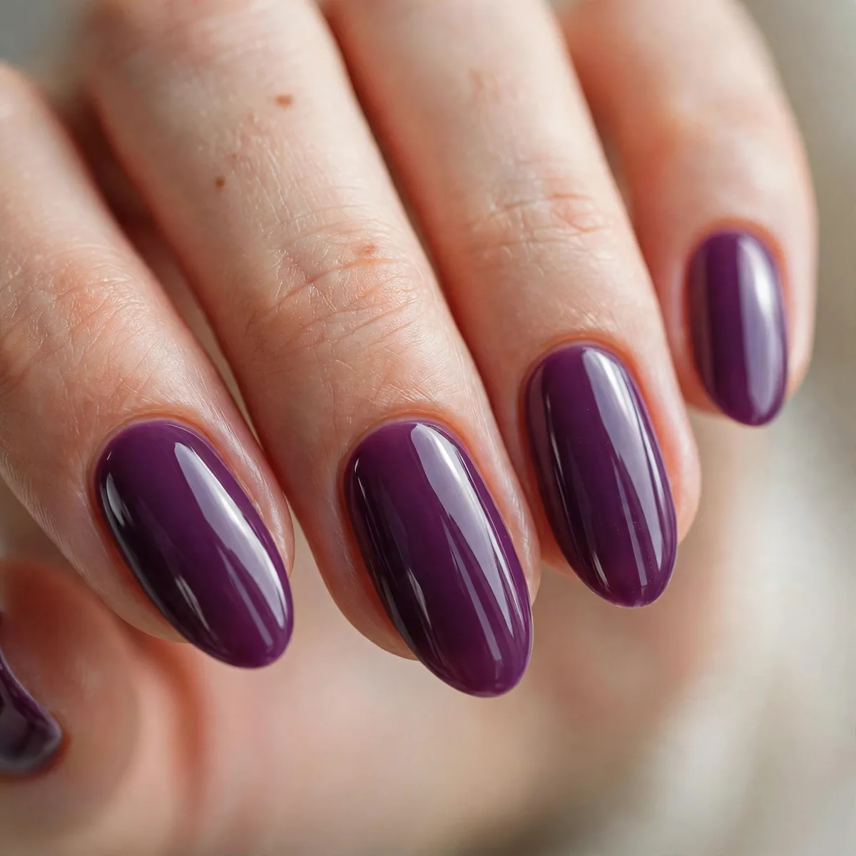 Plum purple glazed donut nails