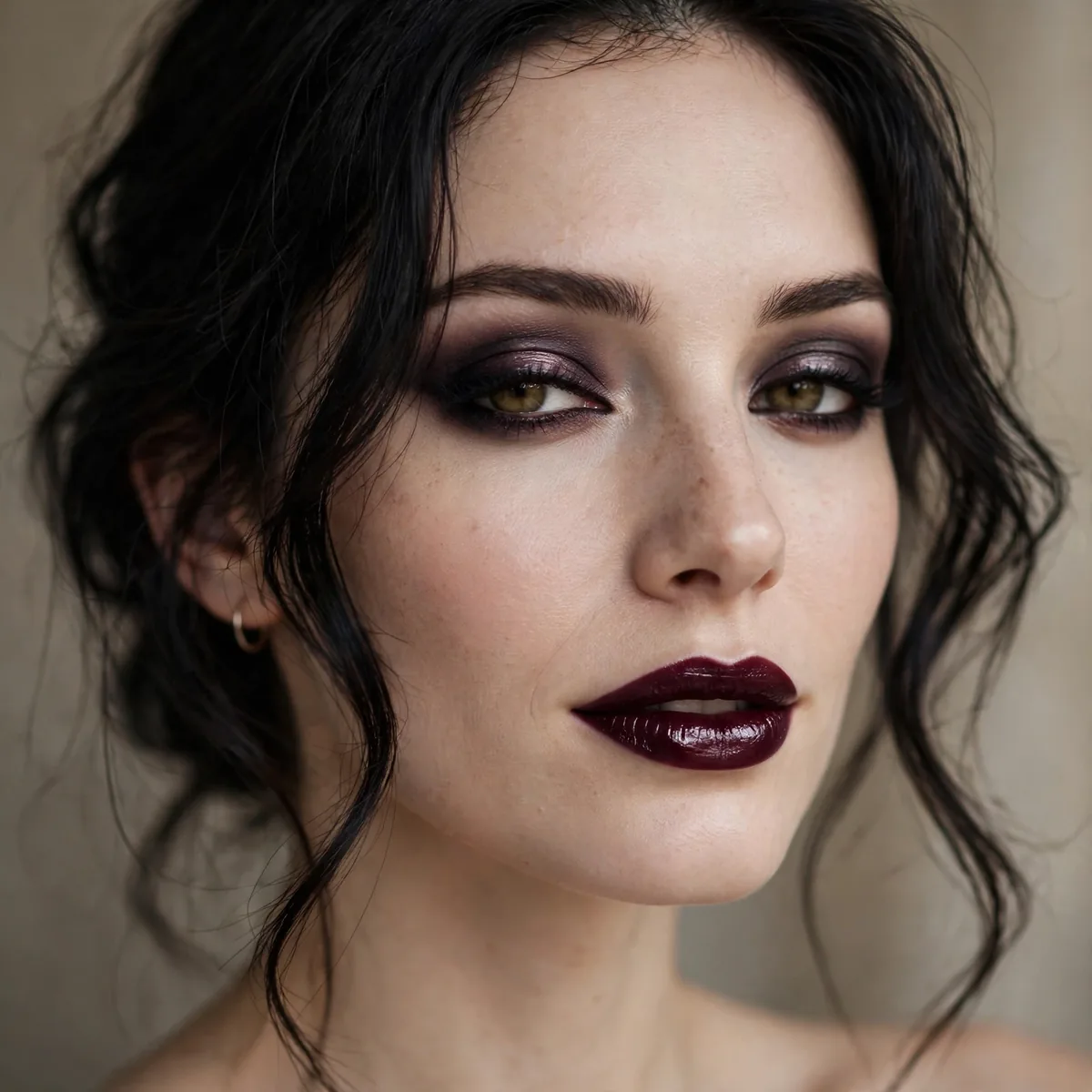 Woman with refined dark elegant goth makeup and wine lips