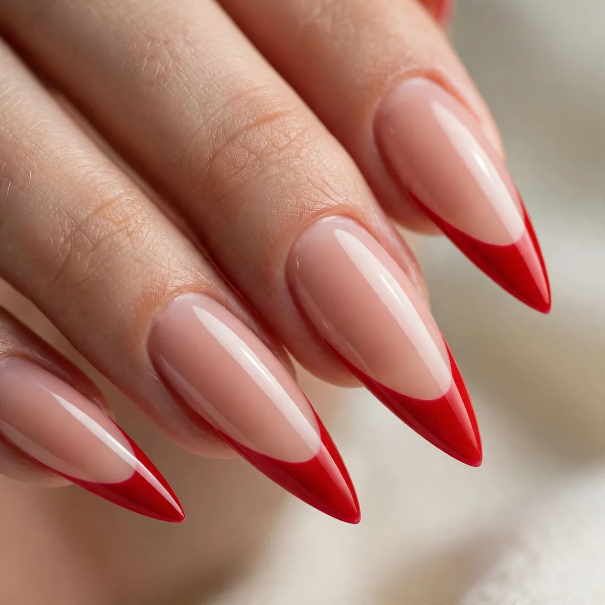 Stiletto nails with red undersides