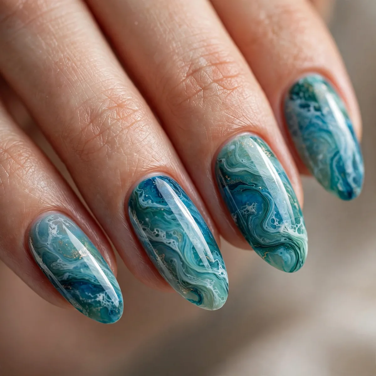 Blue green ocean marble nails