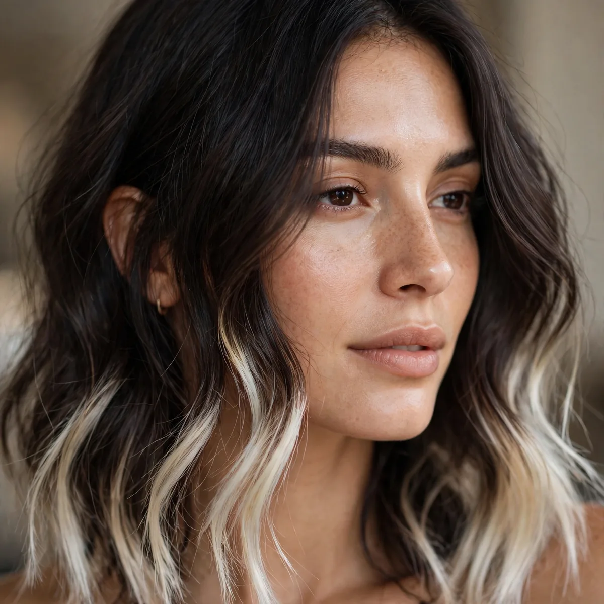Platinum blonde tips on darker hair