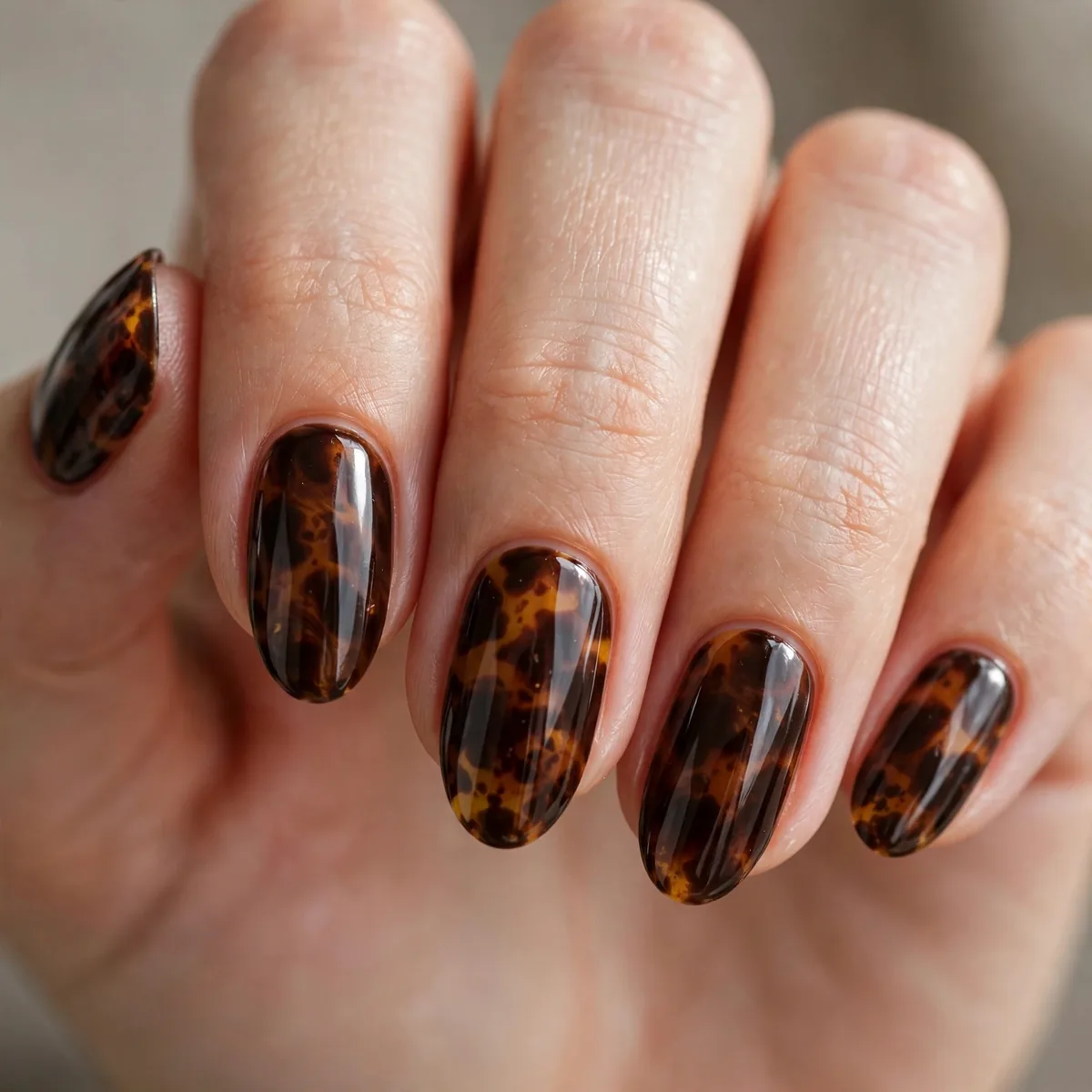 Dark chocolate tortoiseshell nails