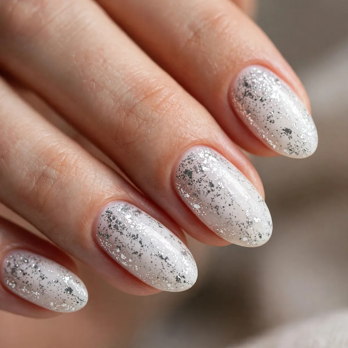 Silver glitter on white nails